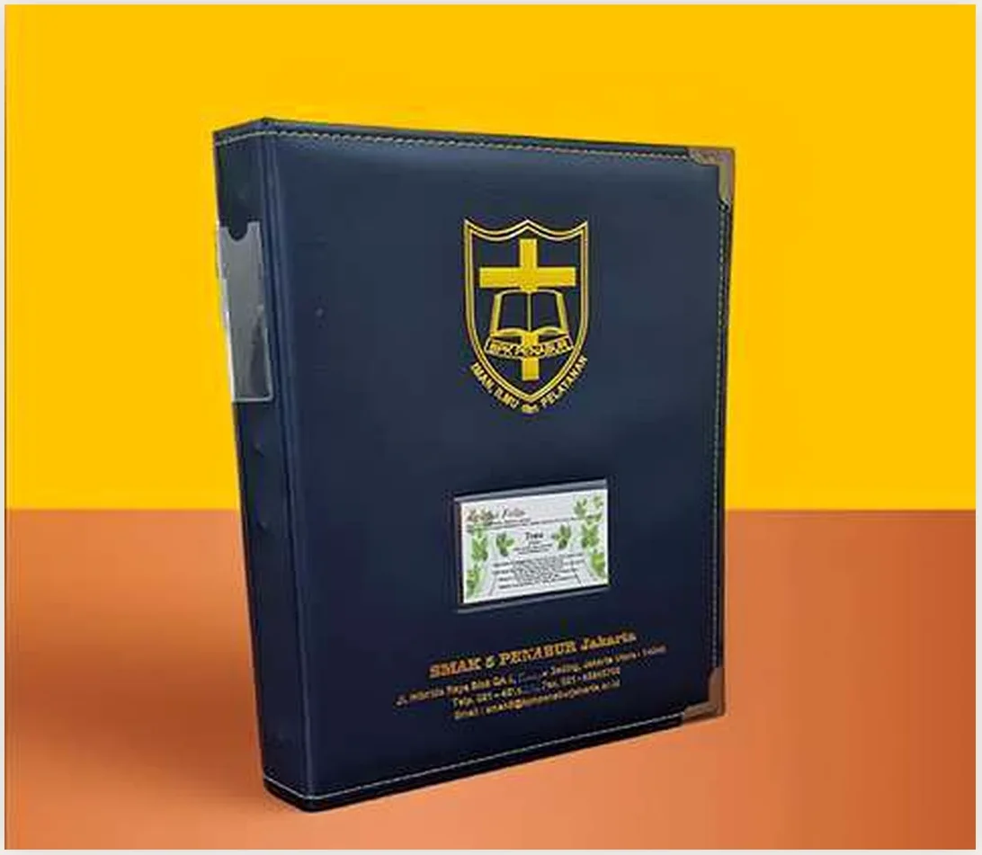 Sampul rapor jahit navy SMAK 5 Penabur Jakarta dengan sudut logam